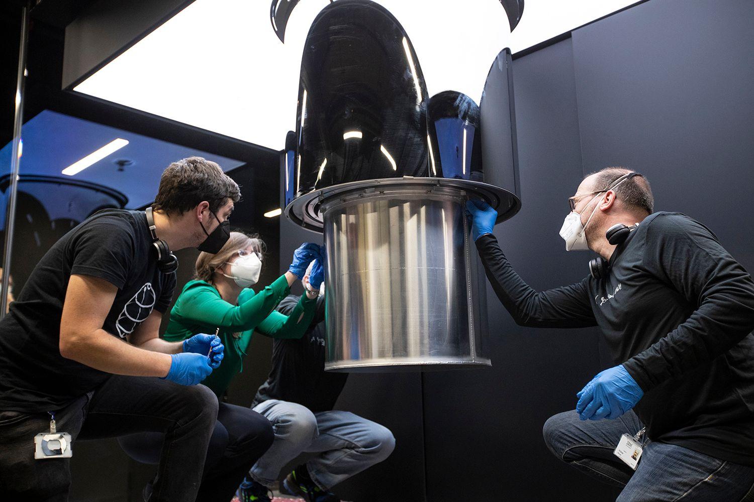 IBM Germany engineers working on the IBM Quantum System One.